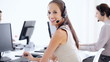 Ceautiful customer care representative smiling at work