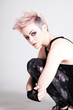 Photo: Female Punk Hugging Her Legs Female Punk Hugging Her Legs