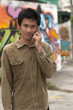 Teenager talking on mobile telephone
