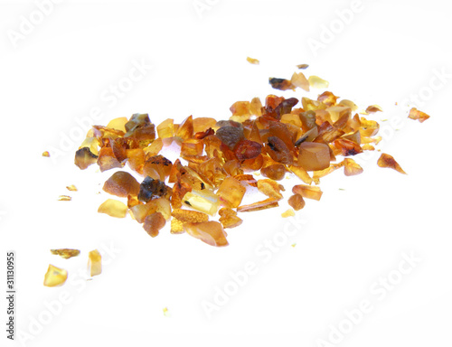 Foto: Stones of amber on white background Stones of amber on white background