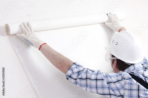 Photo: attaching wallpaper attaching wallpaper