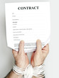 Contract and hands tied
