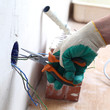 worker puts the wires