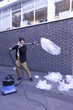 Hoovering up the plastic littering the sheets