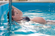Young pregnant woman in swimming pool Young pregnant woman in swimming pool