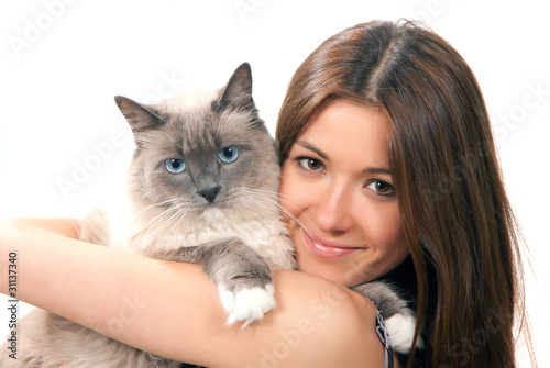 Photo: woman hold her lovely Ragdoll cat with blue eye woman hold her lovely Ragdoll cat with blue eye
