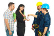 Workers giving keys to couple