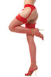 Sexy legs in red underwear and high heel shoes on a white Sexy legs in red underwear and high heel shoes on a white