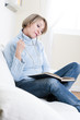 Mature woman reading a book