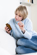 Pensive Woman Taking Pills