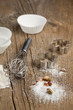 Sugar, metal whisk and cookie cutters Sugar, metal whisk and cookie cutters