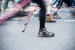 People on nordic walking race in city People on nordic walking race in city