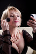 Elegant Woman Making Up