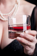 Woman In Evening Gown With Drink
