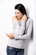 portrait of young  woman with phone on with background