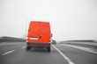 Truck, delivery van on a freeway. Transportation