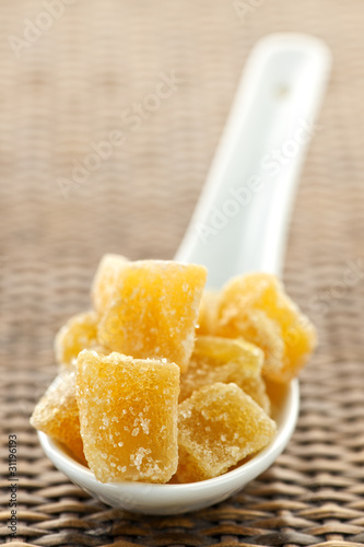 Photo: Candied ginger pieces in spoon Candied ginger pieces in spoon