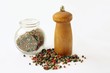 multicolor pepper and small wooden mill