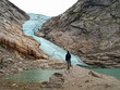 Mountaineer in Briksdal Glacier, Norway Mountaineer in Briksdal Glacier, Norway