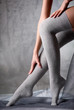 Photo: Beautiful woman legs in grey stockings Beautiful woman legs in grey stockings