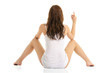 woman sitting on the floor and shows finger woman sitting on the floor and shows finger