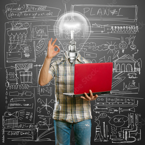 Photo: casual lamp-head with laptop shows OK casual lamp-head with laptop shows OK