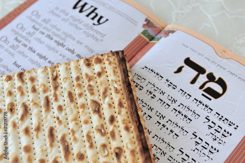 Photo: Traditional Jewish Matzo Sheets on a Passover Seder Table. Traditional Jewish Matzo Sheets on a Passover Seder Table.
