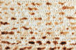 Traditional Jewish Matzo Sheets on a Passover Seder Table.