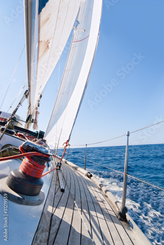 Photo: Yacht sailing in the sea Yacht sailing in the sea