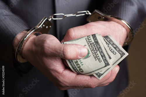 Photo: Business man arrested for bribe Business man arrested for bribe