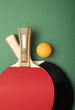 Ping pong paddles and balls