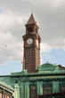 Warrington Plaza and clock tower of Hoboken terminal building