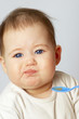 Portrait of the child eating from a spoon