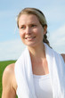Portrait of blond woman exercising outside
