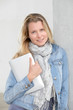 Photo: Portrait of beautiful blond woman using electronic tablet Portrait of beautiful blond woman using electronic tablet