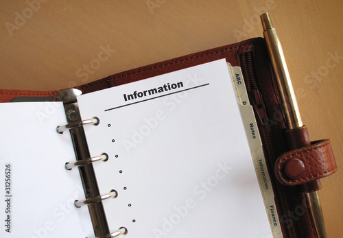 Photo: Business concepts Information list in a personal organizer Business concepts Information list in a personal organizer
