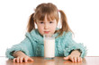 The little girl with a milk glass