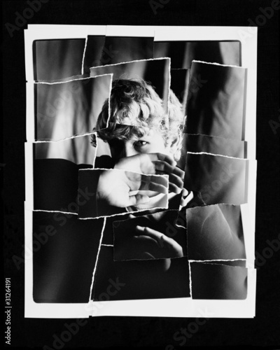 Photo: Torn Up Photo Of Child Blocking Face With Hand Torn Up Photo Of Child Blocking Face With Hand