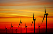 Wind turbines farm at sunset Wind turbines farm at sunset