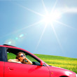 woman in red car