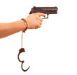 handcuffed man using a gun handcuffed man using a gun