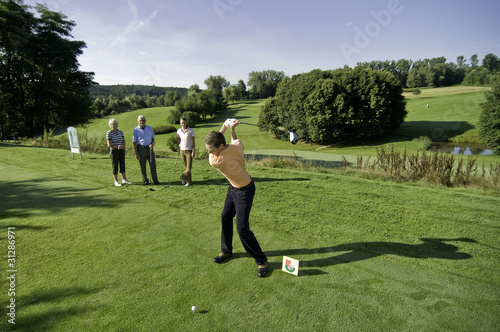 Foto: beim Golfspiel beim Golfspiel