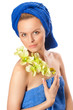 Portrait of young beautiful woman after bath with orchid