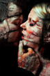 dark art portrait of a young couple kissing