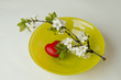 plum blossom  over heart on plate