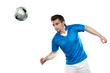 Young football player with ball on isolated background