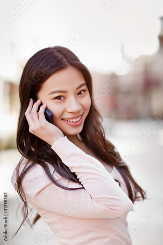 Photo: Asian woman on the phone Asian woman on the phone