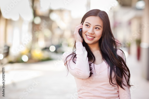 Photo: Asian woman on the phone Asian woman on the phone