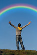 The man admires with a rainbow