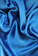 Smooth elegant blue silk as background Smooth elegant blue silk as background
